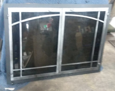 Horizon window pane fireplace doors black frame with natural iron vice bi fold doors standard smoke glass